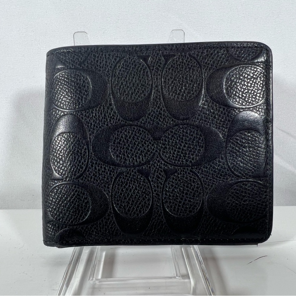 2100: Coach Black Signature Embossed Leather Bifold Wallet Men’s